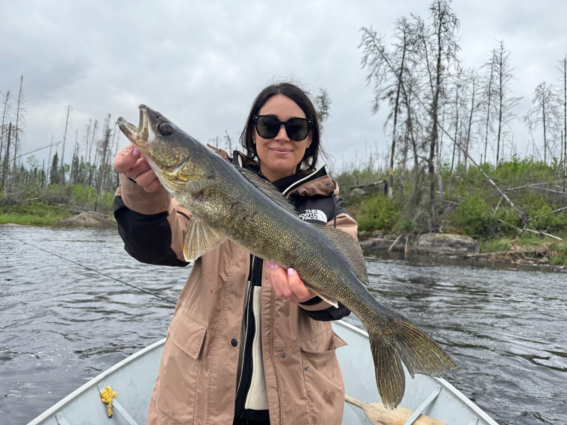 Woman with trophy walleye